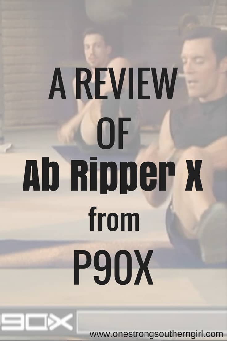 Tony Horton doing an ab exercise sitting on the floor in the P90X Ab Ripper X workout