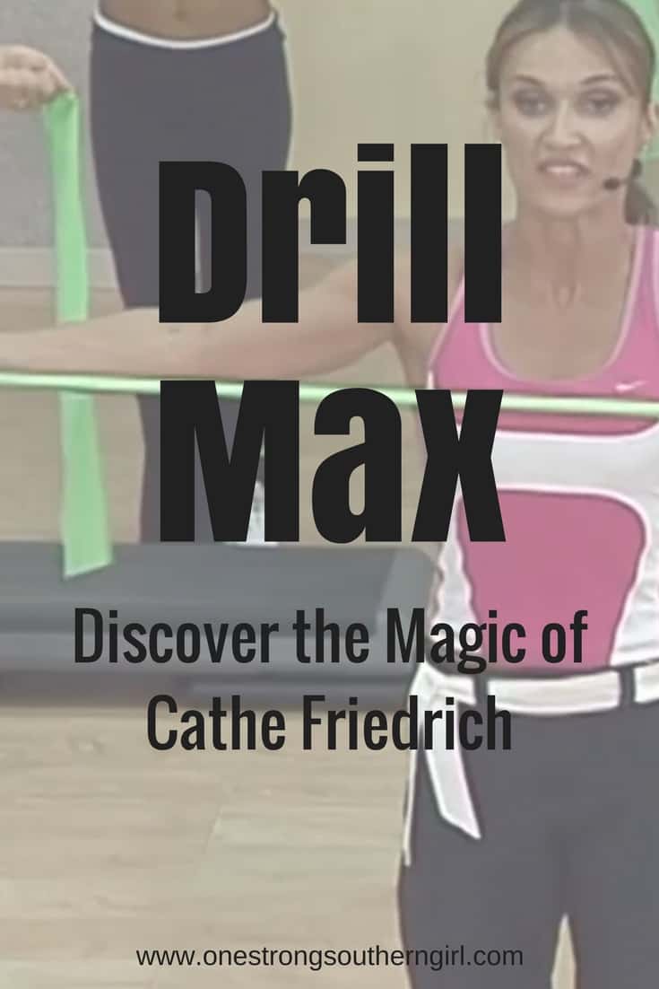 Cathe Friedrich holding a green exercise band and doing the Drill Max workout