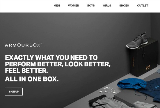 an image from the ArmourBox website that shows blue and black workout gear laying on a table