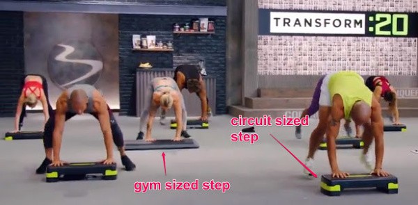 a group of people doing aTransform 20 workout using 2 different kinds of aerobic steps (circuit steps and gym sized steps)